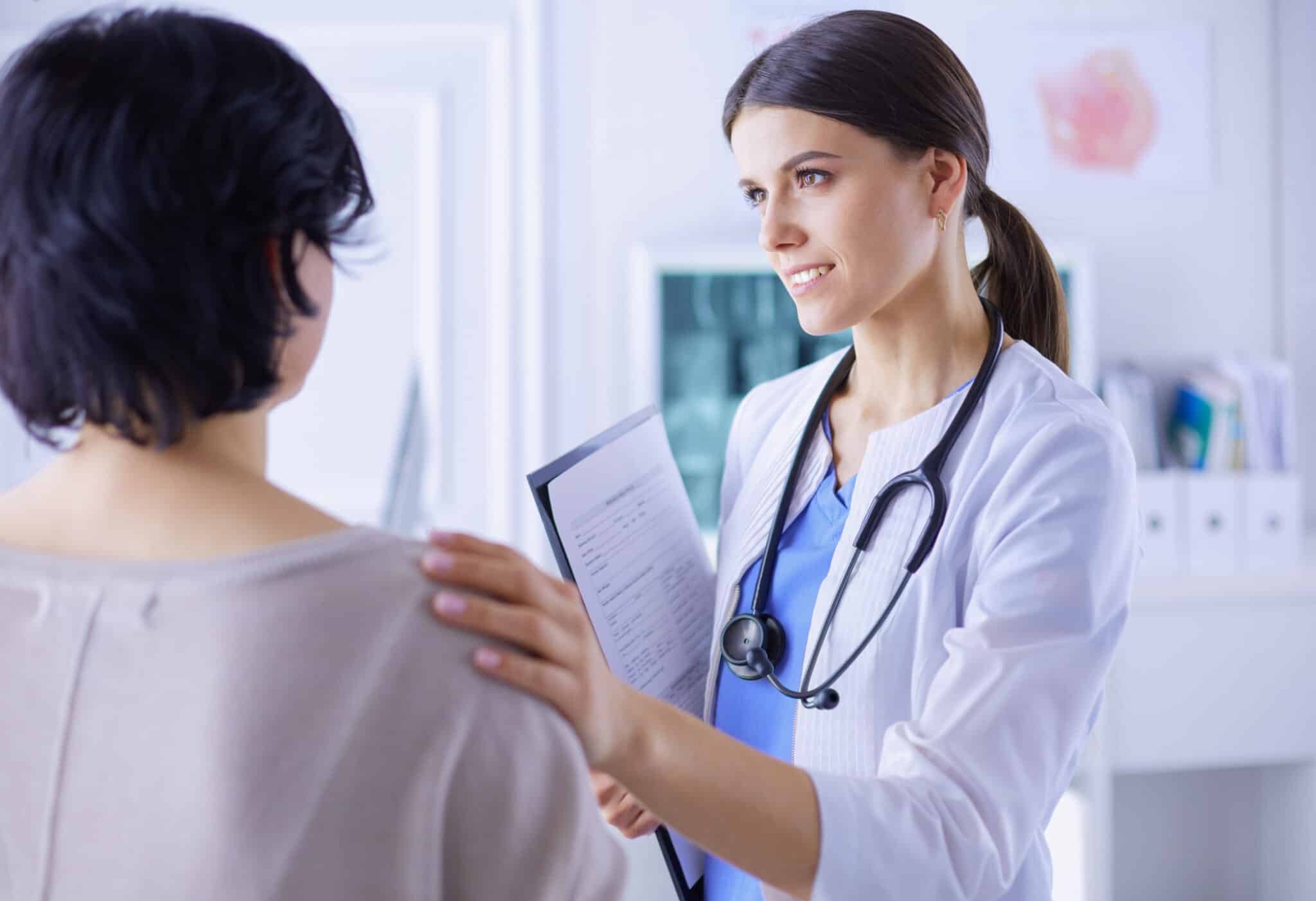 Woman Talking to Doctor About Abortion Options