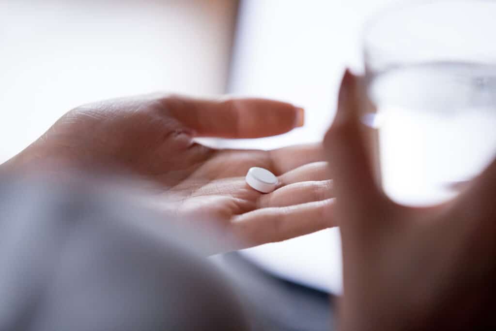 Woman Taking The Abortion Pill